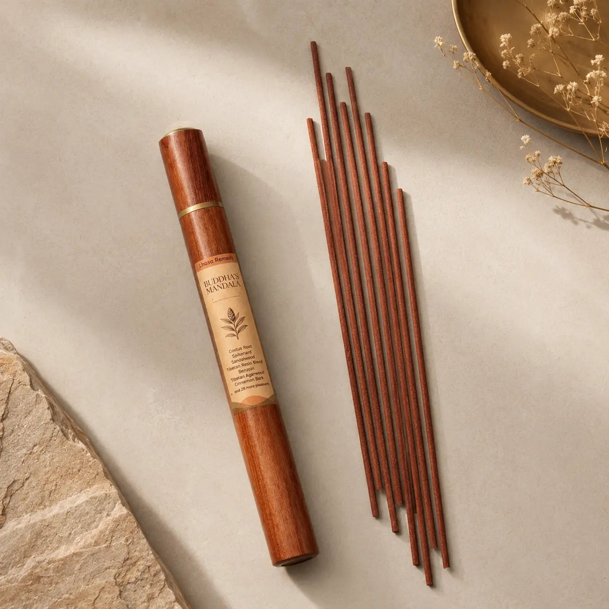 Lhasa Remedy Buddhas Mandala Tibetan incense sticks flat lay beside rosewood tube agarwood cinnamon bark