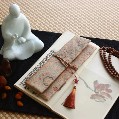 Lhasa Remedy Silken Ritual incense carry pouch cream gold floral brocade pattern gold tassel on book