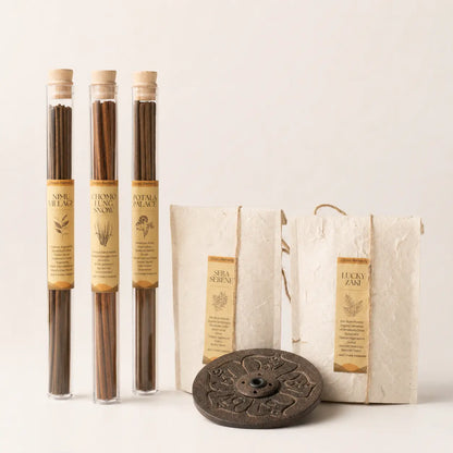 Lhasa Remedy Tibetan incense gift set open kraft box tubes cones paper packets mandala holder surrounded by herbs