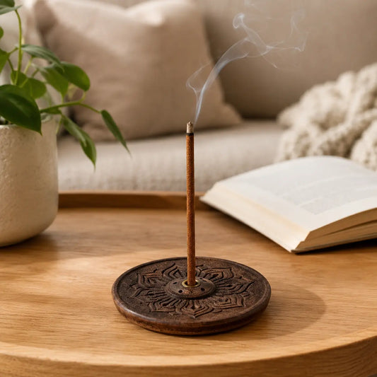 Lhasa Remedy wooden mandala incense holder burning Tibetan incense stick on wood coffee table open book cozy room